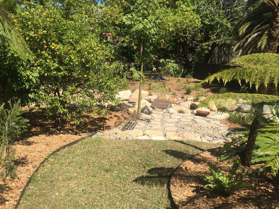 Flat paved area with firepit