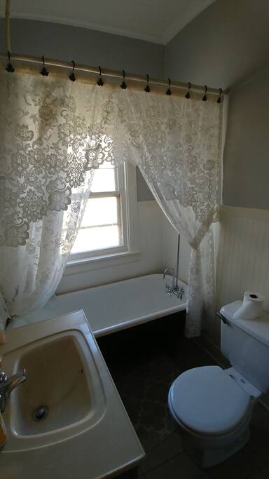 Bathroom with claw foot tub/shower