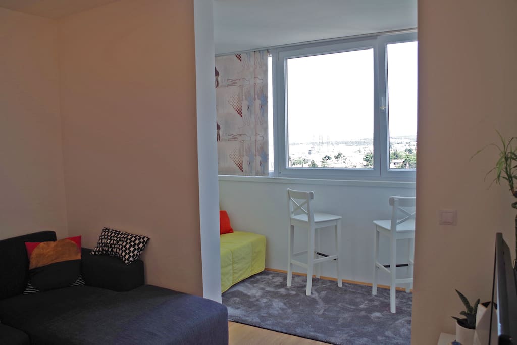 two bar stools to enjoy the view over Pula's harbour
