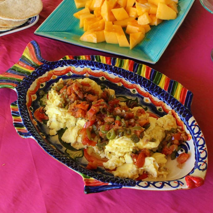 Breakfast of tropical fruit and tasty locally grown food.