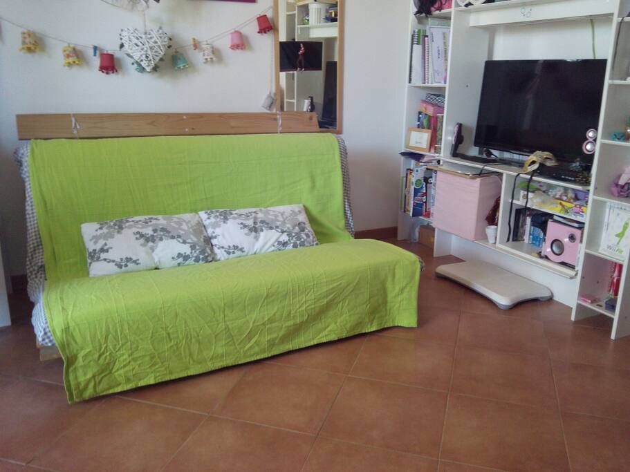 Camera con divano/letto (futon)