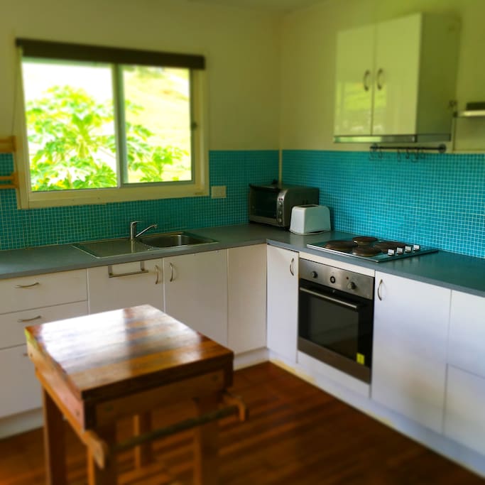 Kitchen with the oven and stove top, toaster, kettle and micro wave are available