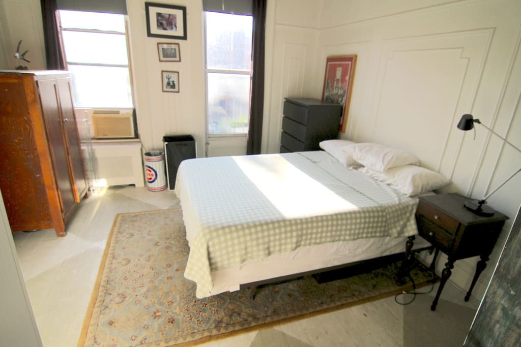 Spacious bedroom with queen bed