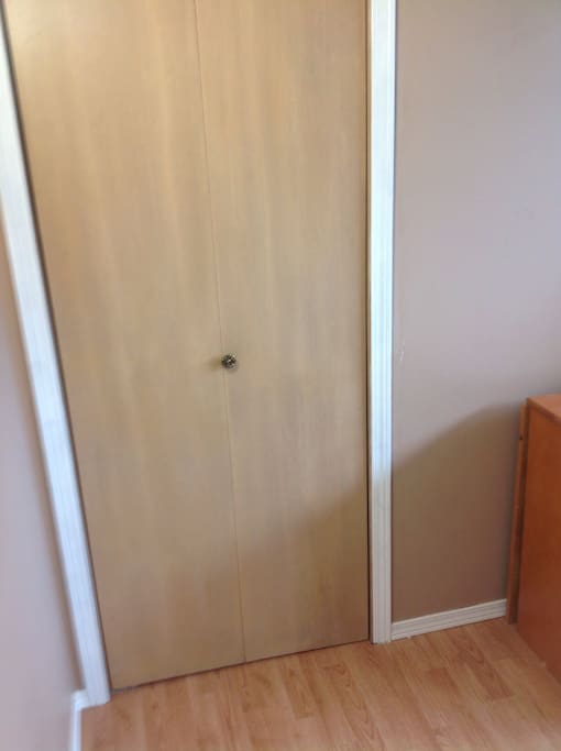 Closet in basement master bedroom.