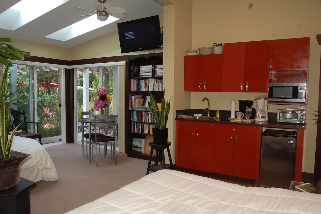 Garden Suite includes kitchenette, library, ceiling fans, TV, 3 skylights, 3 private entrances, views of gardens & waterfalls