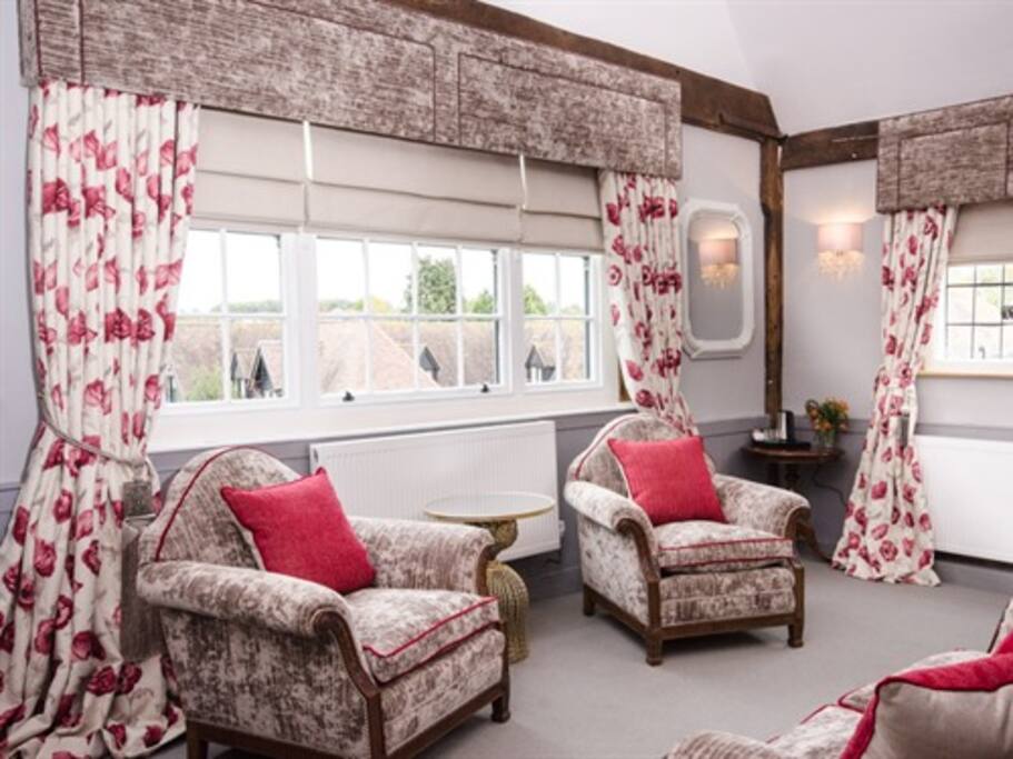 Relax in the lounge area of suite 4.