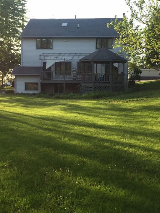 View from back yard. Huge deck for large groups and a gazebo to enjoy the lake breeze.