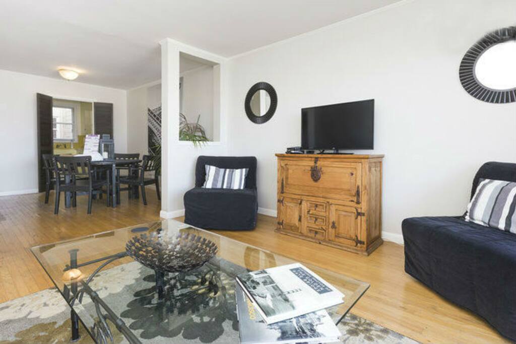 The living room gets nice natural light, good for reading