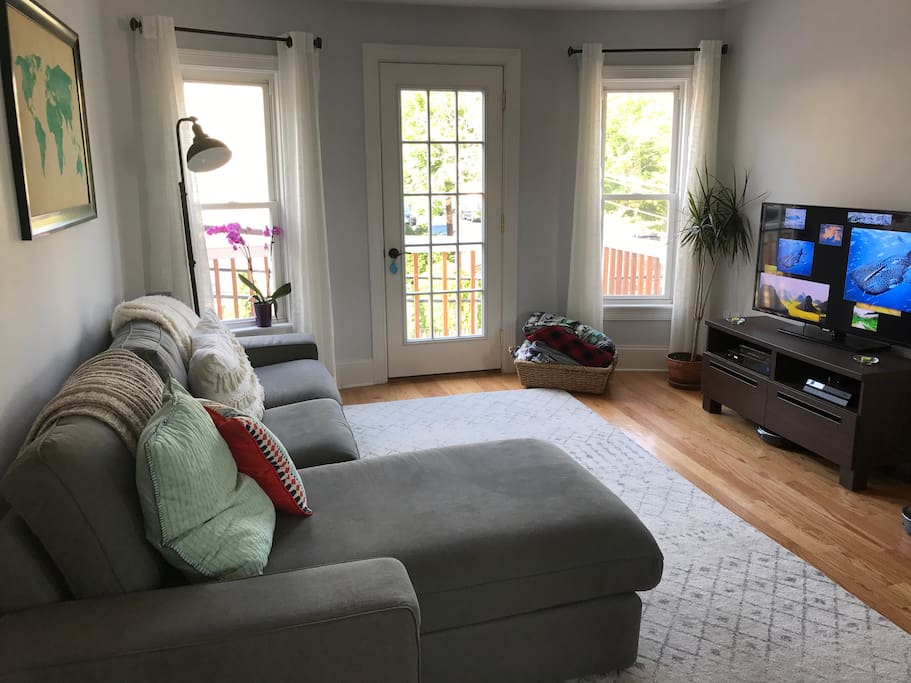 Living area on second floor with front deck access