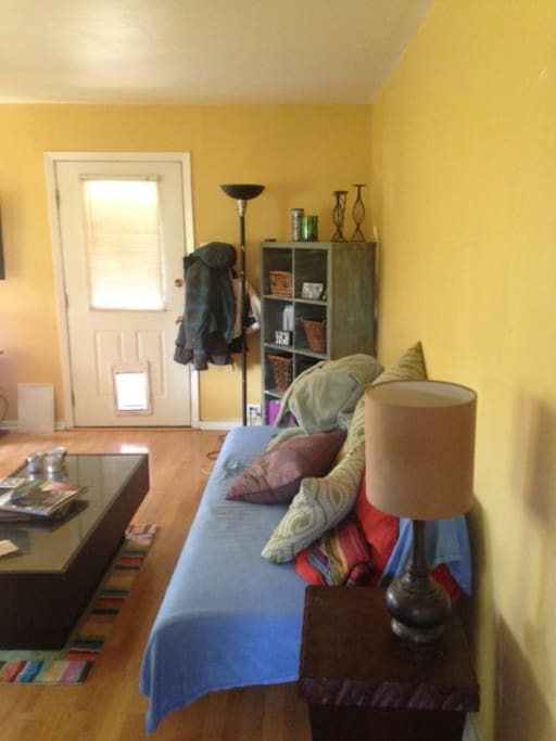 Futon Couch converts to extra bed.