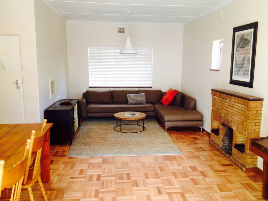 Lounge / dining room with working fireplace for chilly winter evenings.