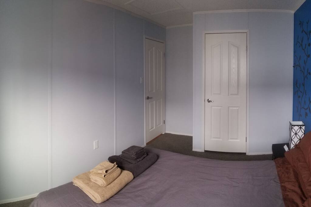 The other side of your bedroom (more wall hangings to come)!