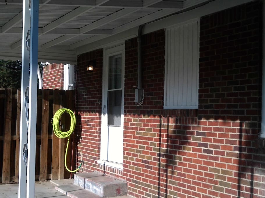 Carport and side patio area