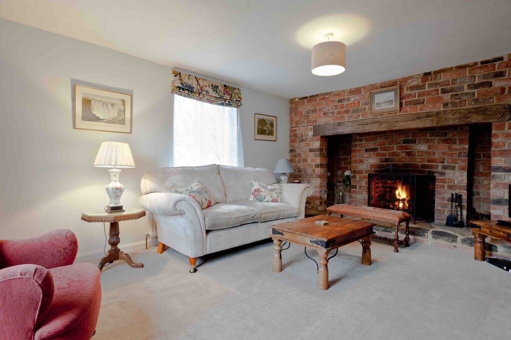 Sitting room with inglenook fireplace