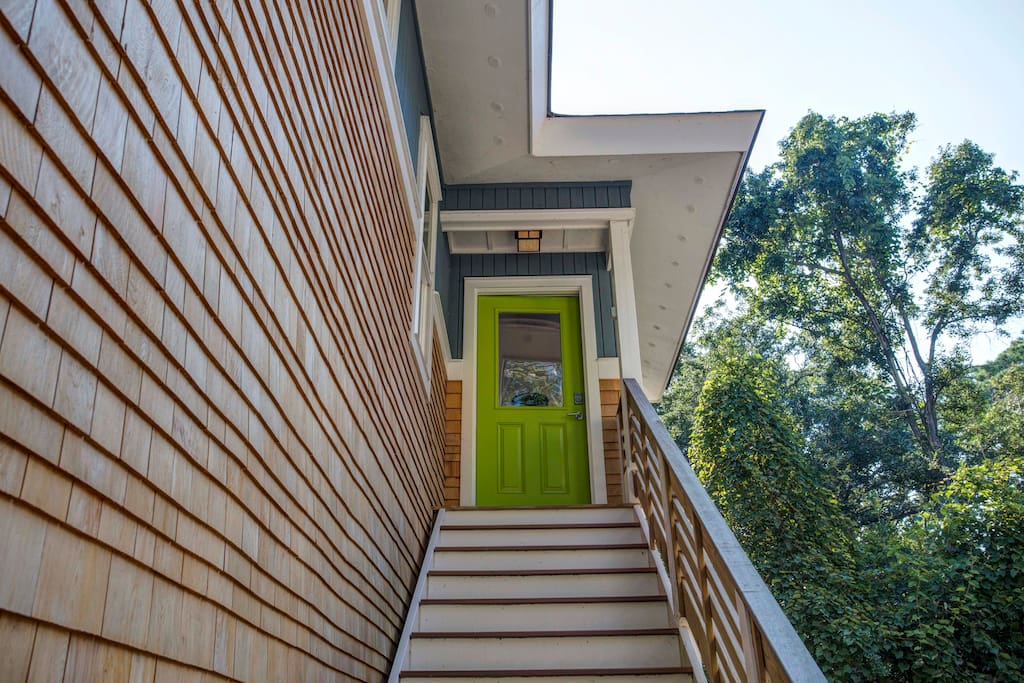 Enter behind the garage through the Green Door!