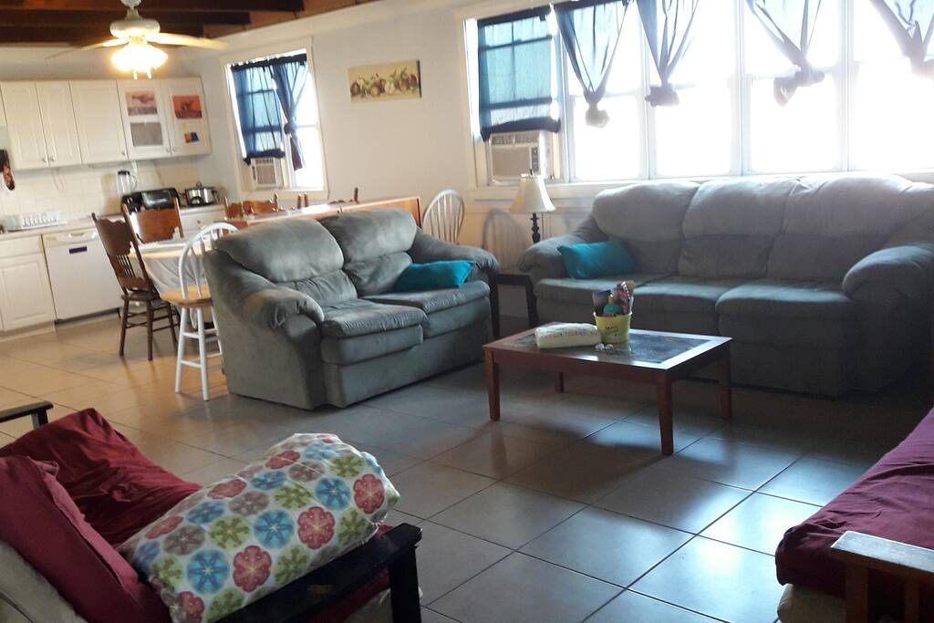 Open main room, all windows shown face the sea! Great sea-breeze when you open them!