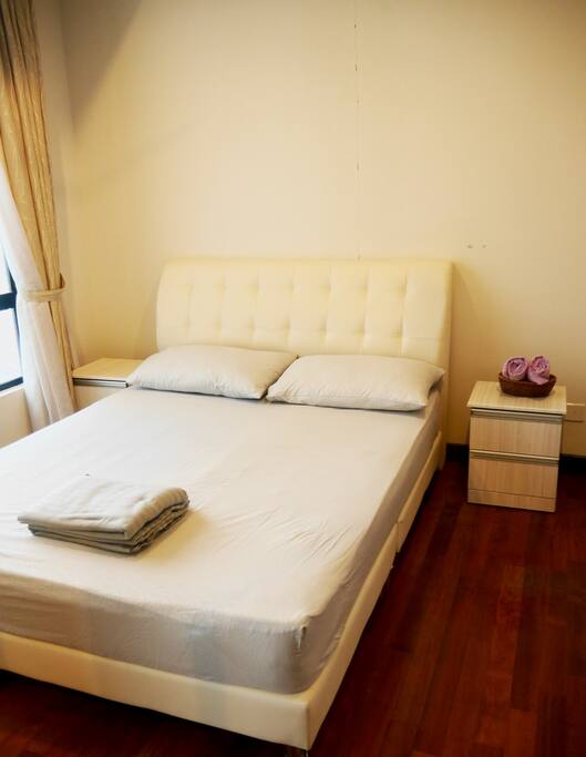 Queen-sized Bed in Room