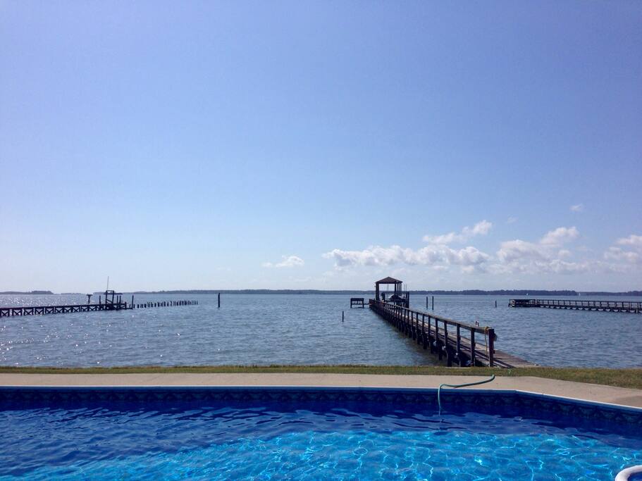 View from pool- dock boat lift, double jet ski lift