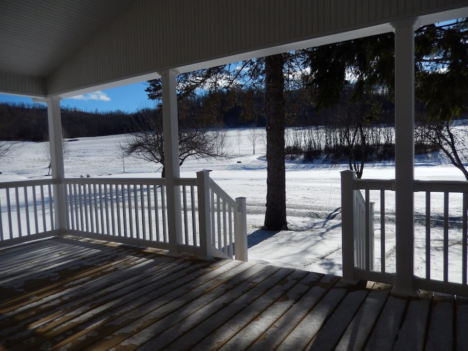 Relaxing on the deck with a view of the countryside.