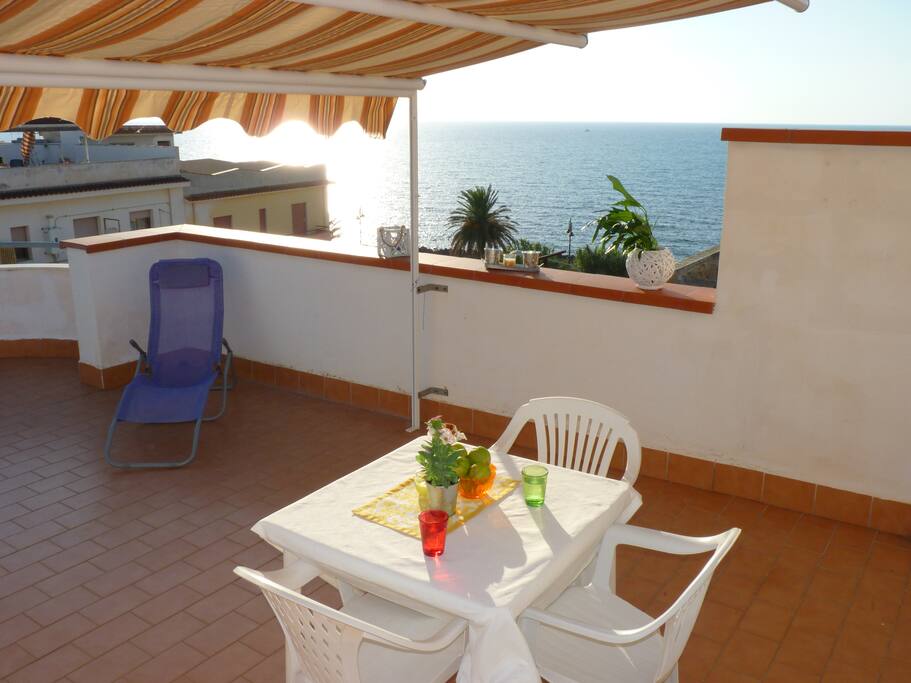 Perfect for a romantic dinner: terrace with view on the sunset at the sea