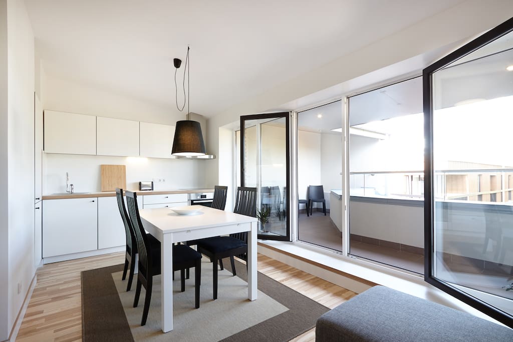 large kitchen and dining area. kitchen includes dishwasher