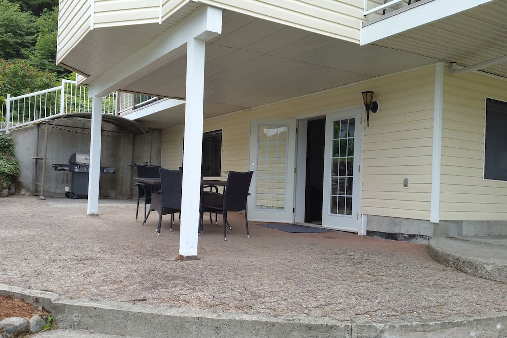 French doors that open onto covered patio, that over looks the water. Also comes with full size BBQ,