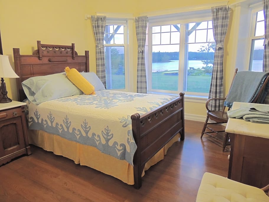The main bedroom looking out onto Prospect Bay.
