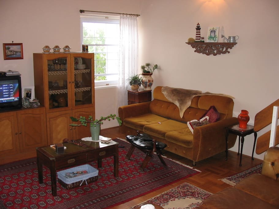 Common Area two couches, TV and two chairs