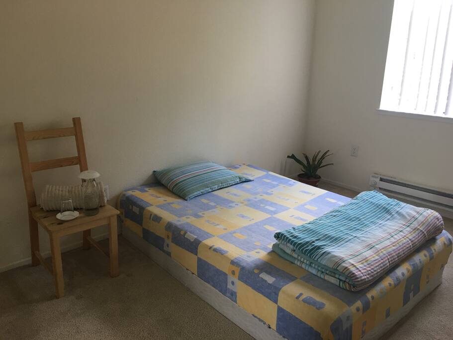 A super comfy, queen sized, memory foam mattress and pillow, and cozy, warm blankew. With Water, towel and toiletries provided.