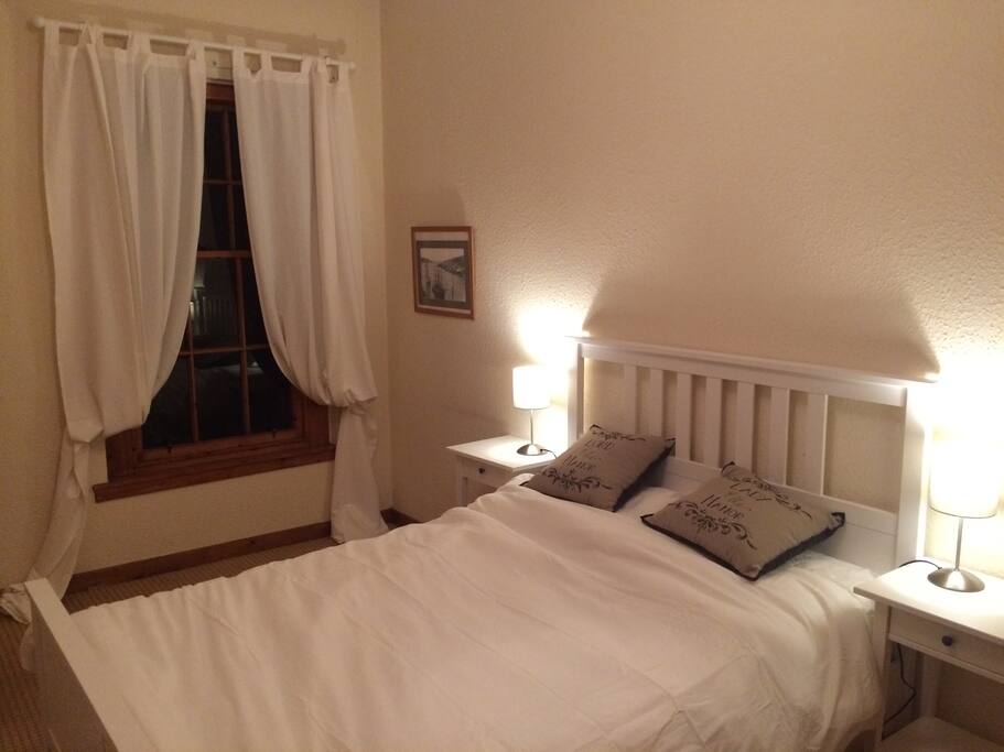 Cosy old fashioned bedroom (with USB chargers in case you forgot...)