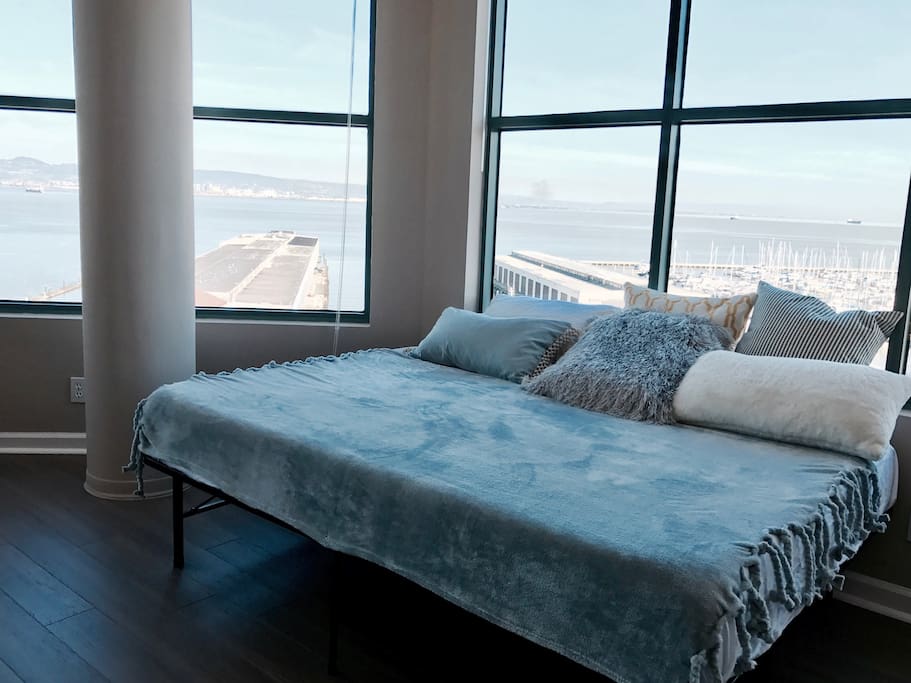 Cozy up and enjoy your day bed with your first coffee or cocktail.