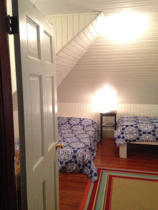 This room features a double and a single bed.