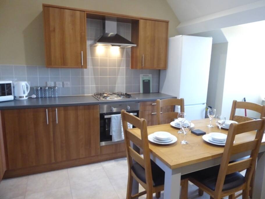 The kitchen/diner side of the living space