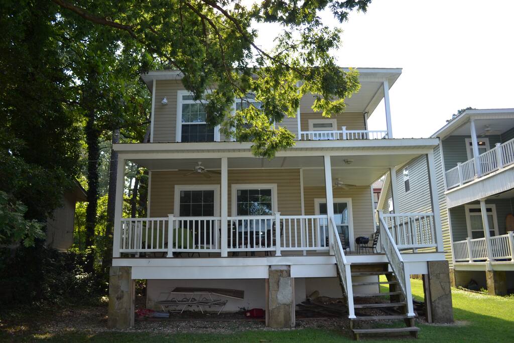 View from the Lake...Fabulous Covered Porch, perfect place to watch the sunset over the Lake!