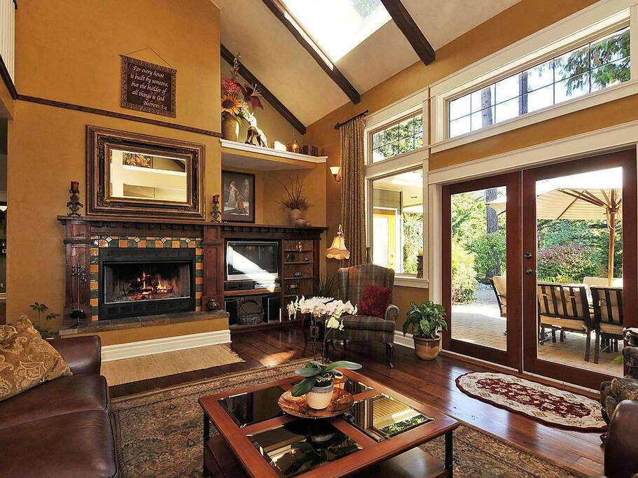 Wood burning fireplace and walk out french doors to serene patio