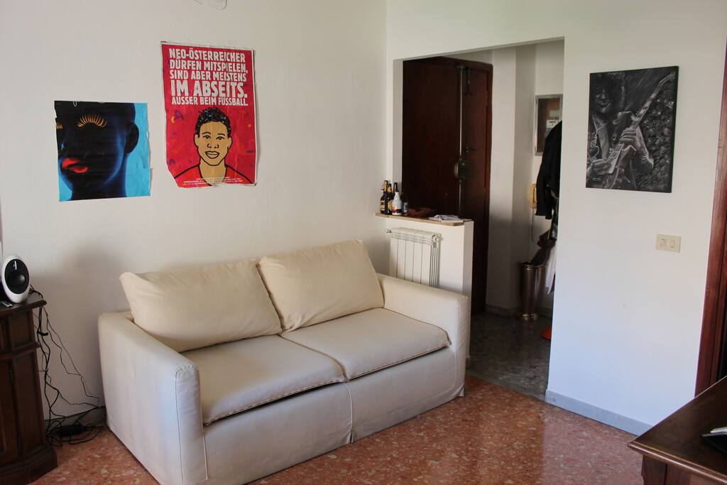 Living room with convertible sofa-bed closed