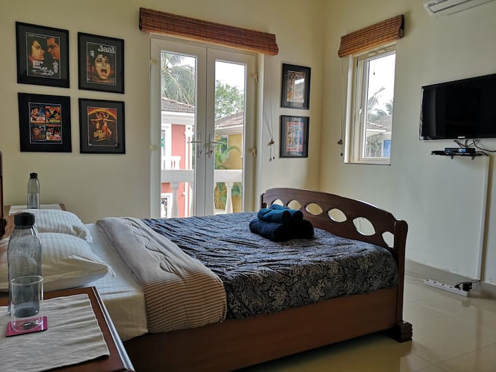 Second bedroom with attached balcony.