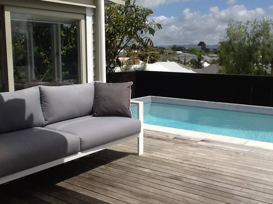Large deck with swimming pool.