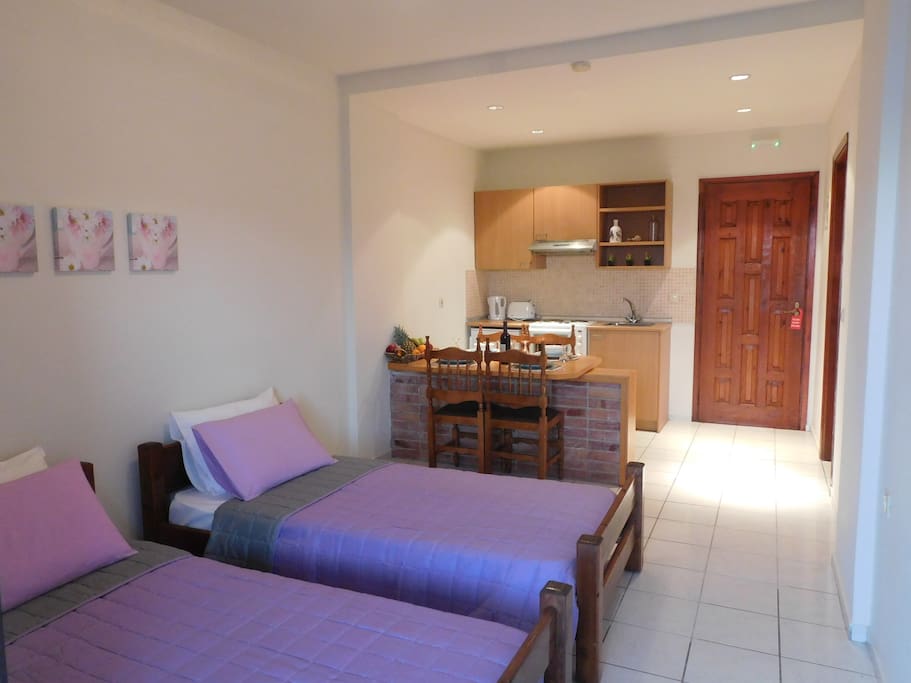Our Quad rooms has two single beds and a King size bed. Great for families
