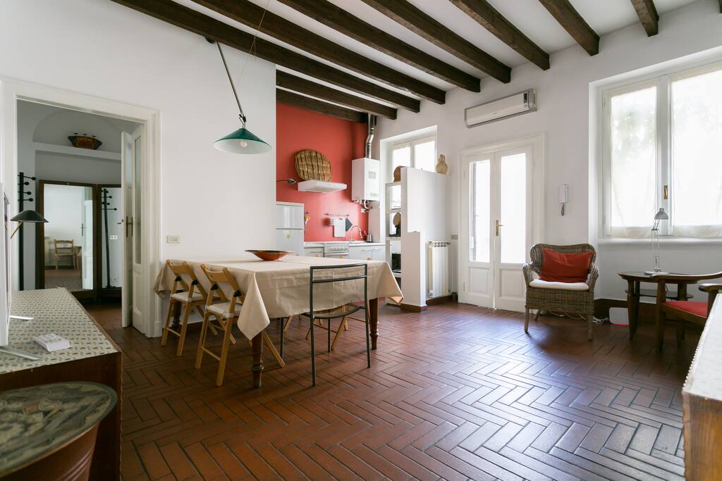 a view of the kitchen and the entrance door