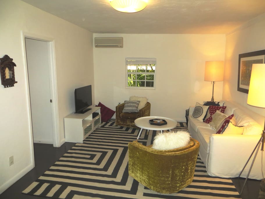 Relaxing living space with central air and premium cable.