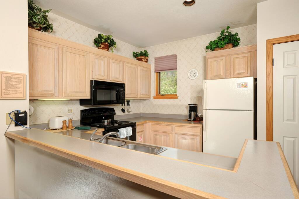 The kitchen has everything you need to cook