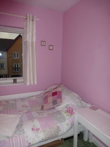 Single room a short walk from city along the river