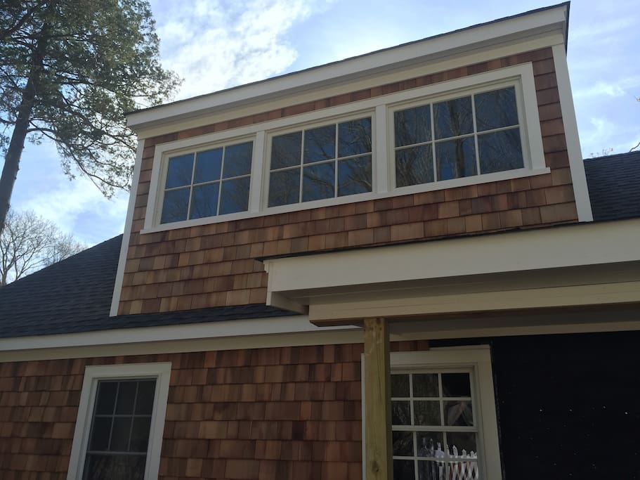 Upstairs bath has large set of transom windows that give it lots of natural light.