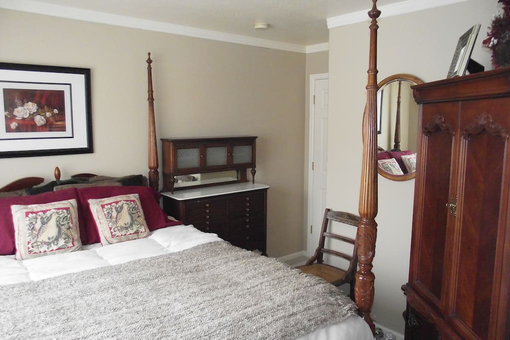TV in the cabinet for your entertainment, smoke detector for your safety, lock on door for your privacy.