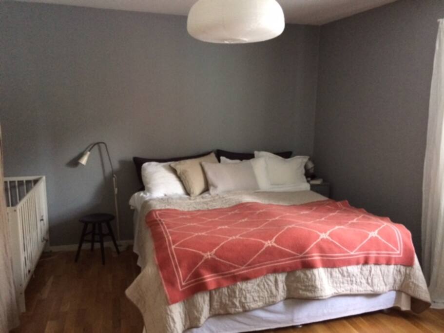 Bedroom with a double bed. The crib is gone, but there is a childrens bed and we have a travel crib if needed.