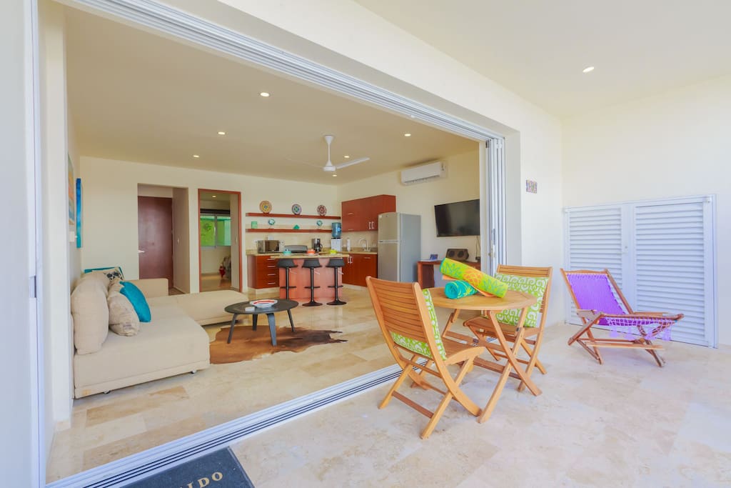 floor to ceiling glass pocket doors for indoor/outdoor living