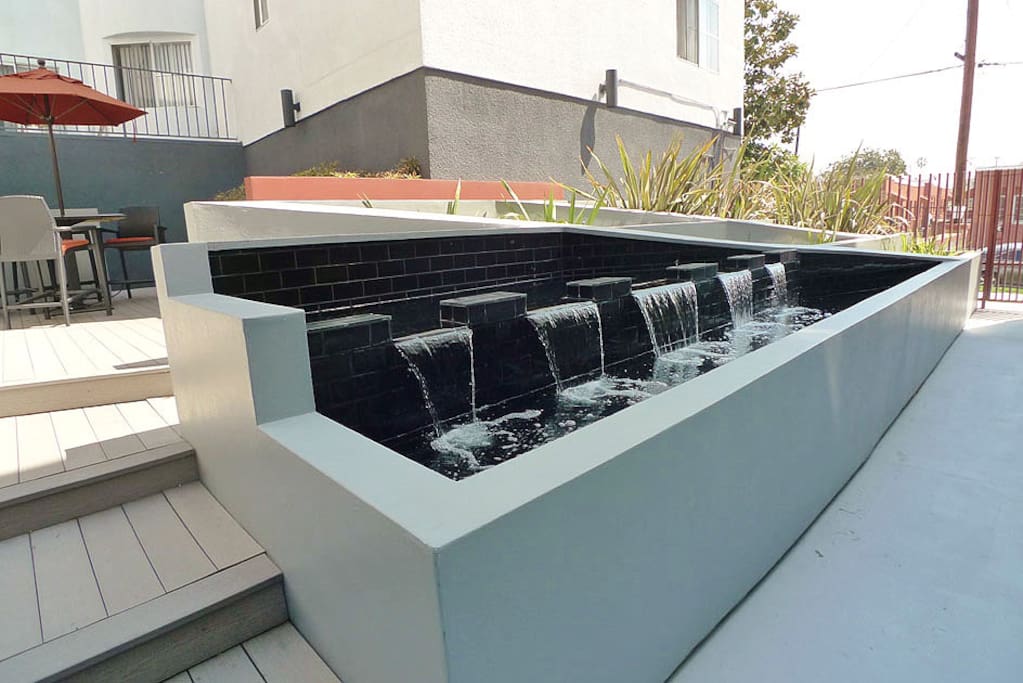 ENTRY COURTYARD W/ FOUNTAIN