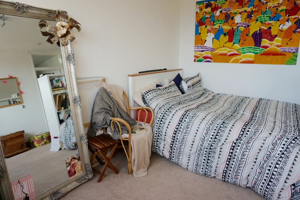 Queen bed and large mirror
