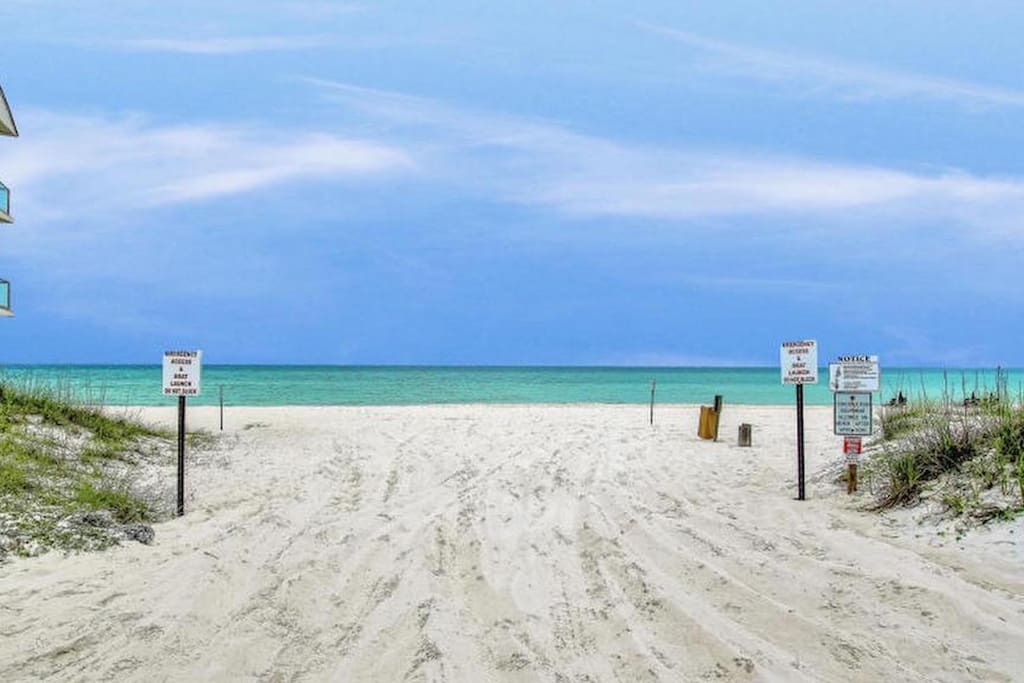 Beach access steps from condo